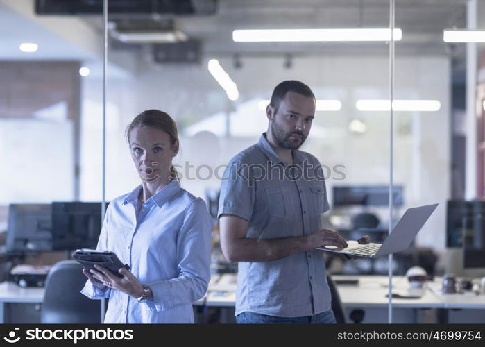 business couple working together on project at modern startup office