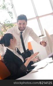 business couple working together on project at modern startup office