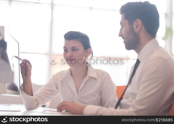 business couple working together on project at modern startup office