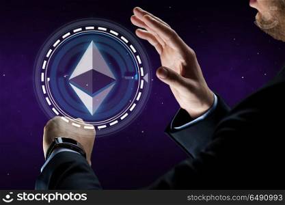 business, cryptocurrency and future technology concept - close up of businessman hands with smart watch hand ethereum hologram over ultra violet space background. male hands with smart watch and ethereum hologram. male hands with smart watch and ethereum hologram
