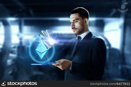 business, cryptocurrency and future technology concept - close up of businessman with transparent tablet pc computer and virtual ethereum symbol hologram over abstract background. businessman with tablet pc and ethereum hologram. businessman with tablet pc and ethereum hologram