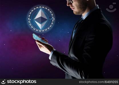 business, cryptocurrency and future technology concept - close up of businessman with transparent smartphone and ethereum hologram over space background. businessman with smartphone and ethereum hologram. businessman with smartphone and ethereum hologram