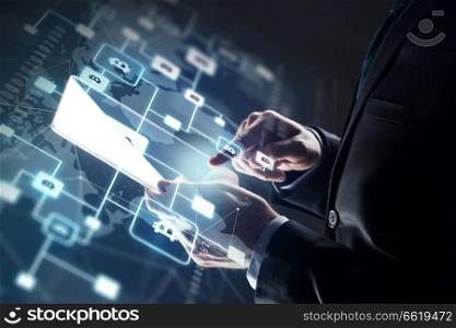 business, cryptocurrency and future technology concept - close up of hand with virtual bitcoin block chain hologram transparent tablet pc computer screen over black background. close up of hand with tablet pc and bitcoin