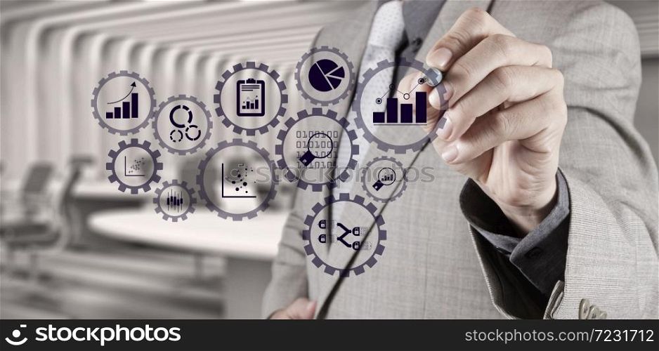 Business data analytics management with connected gear cogs with KPI financial charts and graph.businessman hand writing in the whiteboard or virtual screen