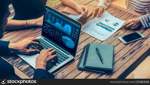 Business data dashboard analysis by ingenious computer software . Investment application display business sales and profit on the computer screen and advise marketing planning decision .. Business data dashboard analysis by ingenious computer software