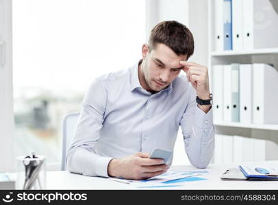 business, deadline, people and technology concept - close up of businessman with smartphone