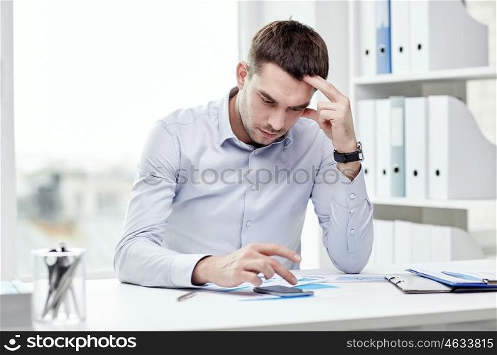 business, deadline, people and technology concept - close up of businessman with smartphone