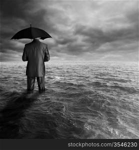 business depression concept, man with black umbrella in the ocean, selective focus
