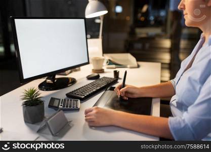 business, design and technology concept - creative woman or graphic designer with computer and pen tablet working at night office. designer with computer and pen tablet at office