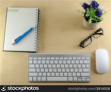 Business desk with keyboard and pen. Top view with copy space