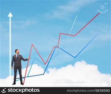 business, development and people concept - smiling man holding graph line over chart and blue sky background
