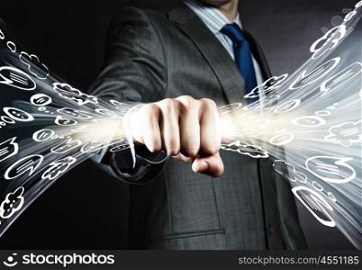 Business dialogues. Close up of businessman grasping light in fist
