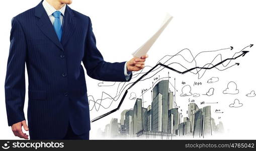 Business documentation. Close up of businessman with papers in hands