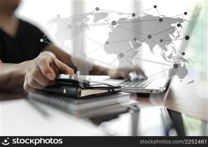 business documents on office table with digital tablet and man working with smart phone in the background with social network diagram concept 