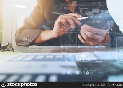 business documents on office table with digital tablet computer with smart phone and graph business digital diagram and businessman working in the background