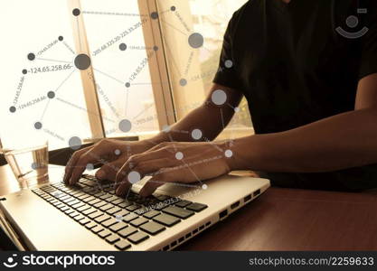 business documents on office table with smart phone and digital tablet and graph business diagram and man working in the background