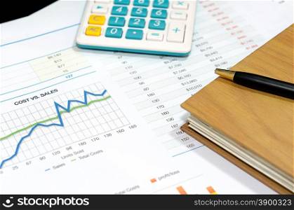 business documents with charts growth, keyboard and pen. workplace businessman