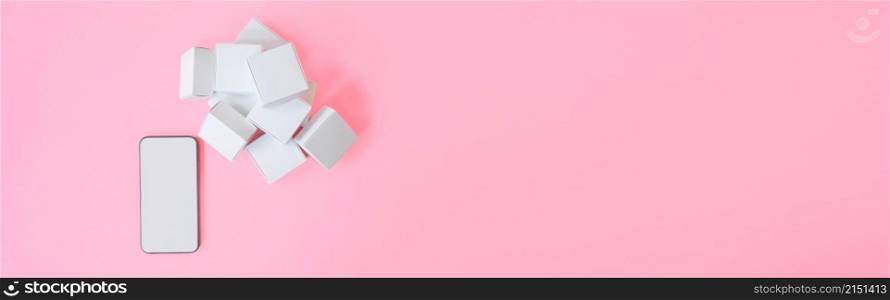 Business e-commerce or Marketing strategy concepts from smartphone with blank screen and product box on pink background. Top view, web banner size.