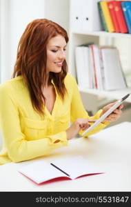 business, education and technology concept - smiling student with tablet pc computer and notebook in college