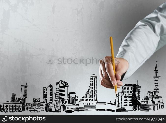 Business education. Close up of businesswoman hand drawing business sketches