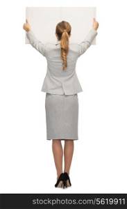 business, education, people and office concept - businesswoman or teacher in suit from back