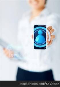 business, education, people and technology concept - close up of businesswoman showing smartphone screen with contact icon