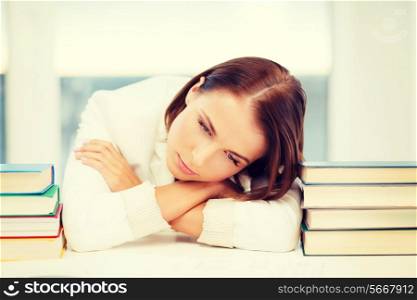 business, education, people concept - tired businesswoman or student with pile of books and notes studying indoors