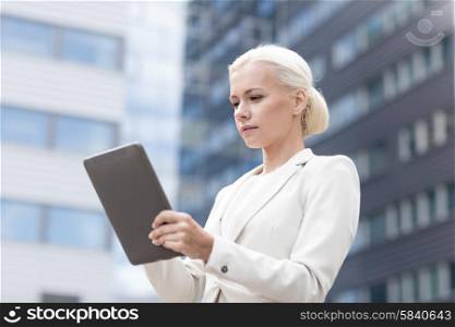 business, education, technology and people concept - businesswoman working with tablet pc computer on city street