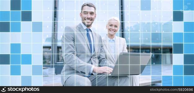 business, education, technology and people concept - smiling businesspeople working with laptop computer on city street over blue squared grid background
