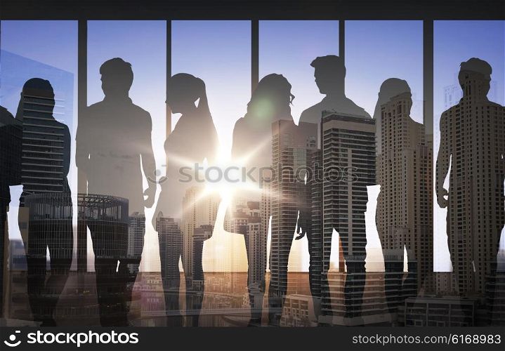 business, education, travel, tourism and people concept - people silhouettes over double exposure office or city airport background
