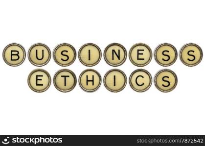 business ethics text in old round typewriter keys isolated on white