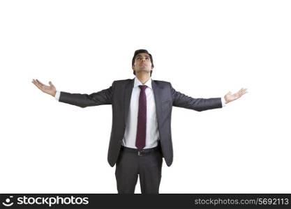Business executive enjoying with arms outstretched