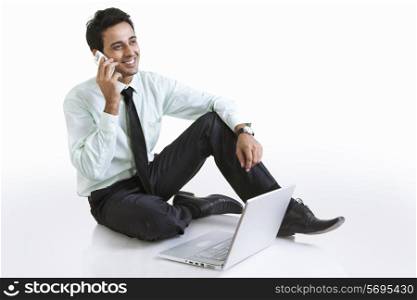 Business executive talking on a mobile phone