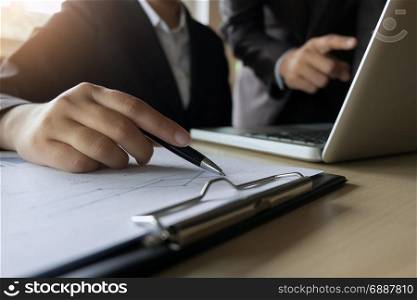 Business executives analysis data document with accountant at workplace