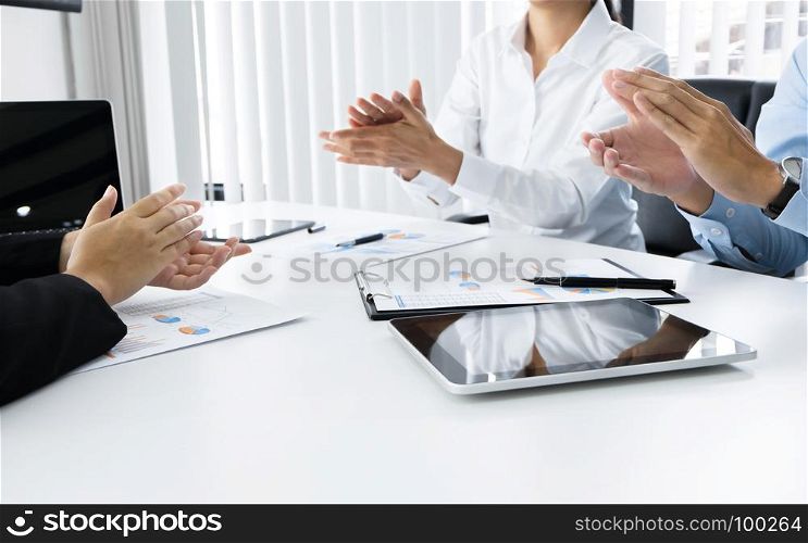 business executives ceo clap a hands agreement success deal with partnership at a meeting