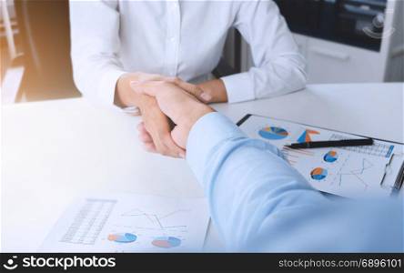 business executives ceo handshake at meeting room