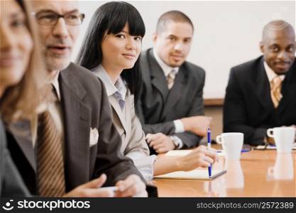Business executives in a board room