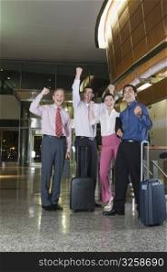Business executives looking excited at an airport
