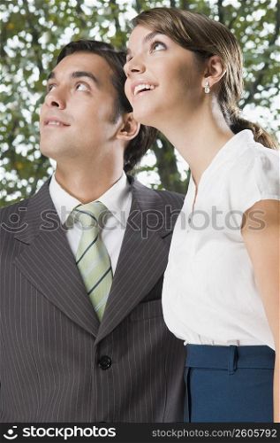 business executives looking up in an office