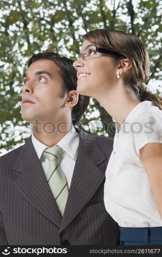 business executives looking up in an office