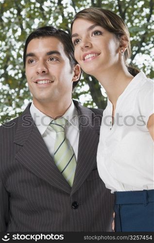 business executives smiling in an office