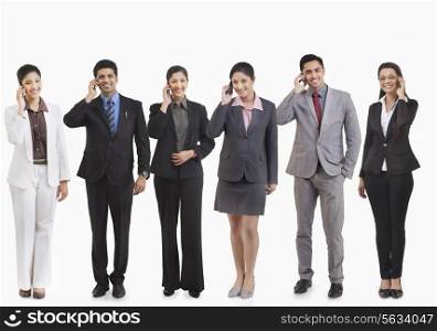 Business executives talking on a mobile phone