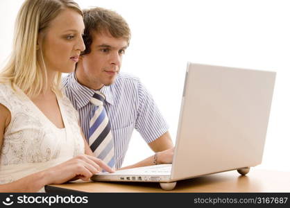 Business executives with a teenage girl standing in a row and smiling