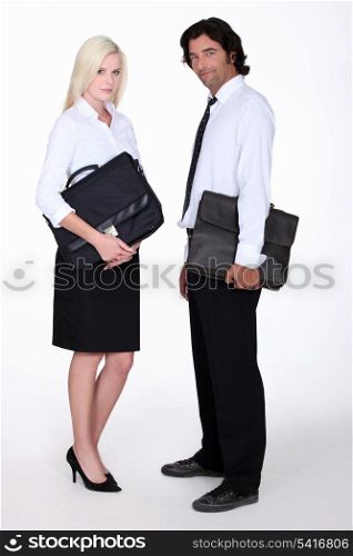 Business executives with briefcases