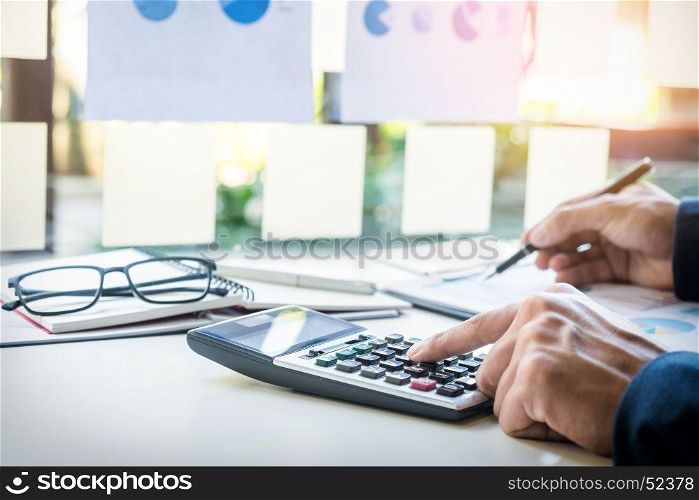 Business finance man calculating budget numbers, Invoices and financial adviser working.