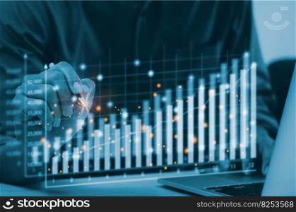 business finance technology and investment concept. businessman analysis graph and chart data management growth with computer laptop on desk.
