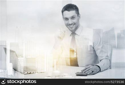 business, finances and people concept - smiling businessman with laptop computer and calculator at office over city background and double exposure effect. smiling businessman with laptop and documents