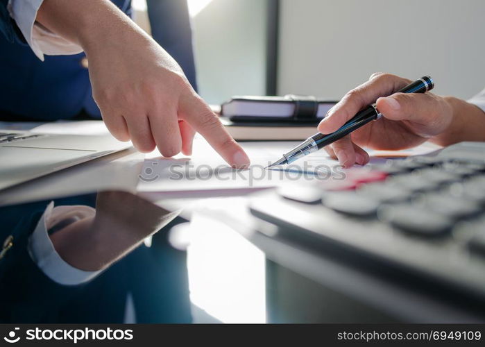 Business financier analysis data document with accountant, selective focus