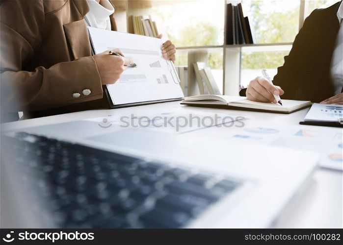 business financier audit working with laptop and data annual report