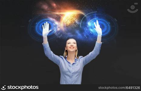 business, future technology and augmented reality concept - businesswoman with virtual planet and space hologram. businesswoman with virtual space hologram. businesswoman with virtual space hologram